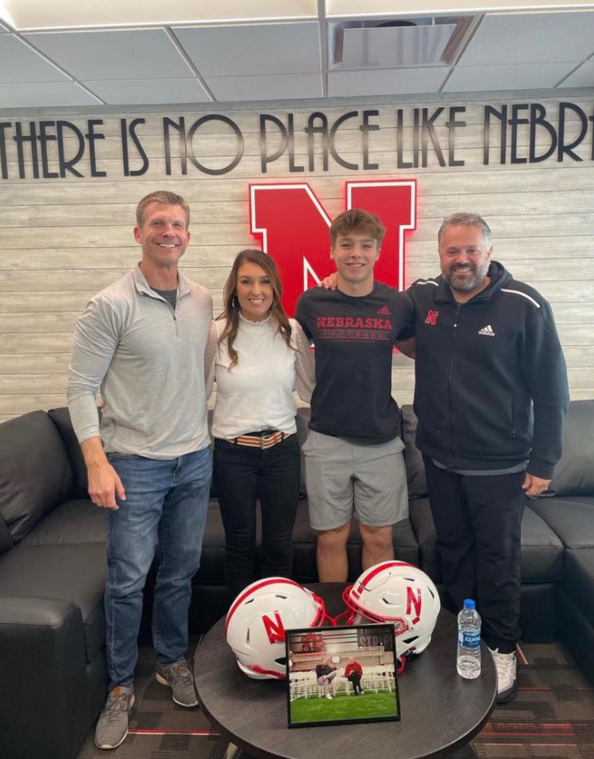 Caden VerMaas poses with his family and UNL Head Football Coach Matt Rhule. Committing accomplished his lifelong dream of playing football for Nebraska. 